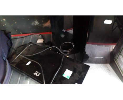 A Samsung Blu-Ray dvd player, a Samsung speaker and an LG speaker 