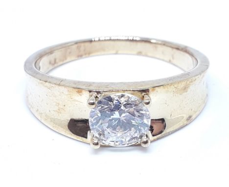 A silver gilt solitaire ring set with a colourless stone, marked '925 DQCZ', size V, with box. 