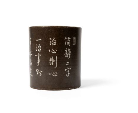  CHINESE GRISAILLE-DECORATED 'INSCRIBED' BRUSH POT QIANLONG MARK BUT REPUBLIC PERIOD 民國 乾隆底款 蝸寄側款 墨地詩文筆筒of cylindrical form, 