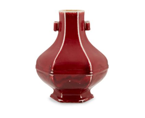  CHINESE COPPER RED GLAZED HEXAGONAL VASE QIANLONG MARK BUT 19TH-20TH CENTURY 十九至二十世紀 乾隆款 紅釉六方貫耳壺the six-sided vessel rising 