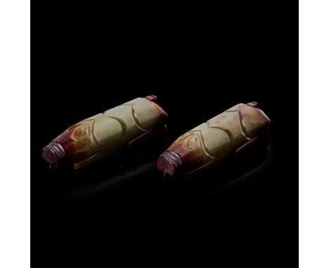 [PRIVATE ENGLISH COLLECTION, ENGLAND] PAIR OF CHINESE CELADON JADE 'PIG' HAND HOLDERS  青玉帶沁雕玉握豬（一對）each carved from a cuboid