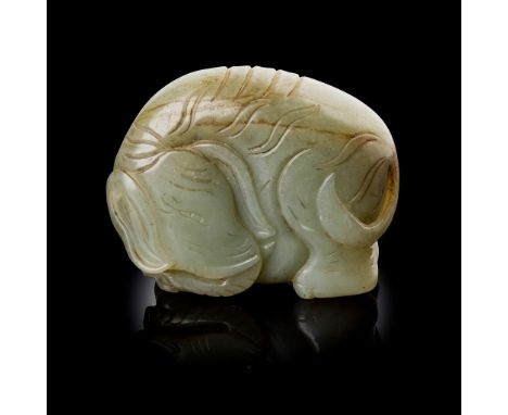  [PRIVATE ENGLISH COLLECTION, ENGLAND] CHINESE CELADON JADE WITH RUSSET INCLUSIONS CARVING OF AN ELEPHANT QING DYNASTY, 19TH 