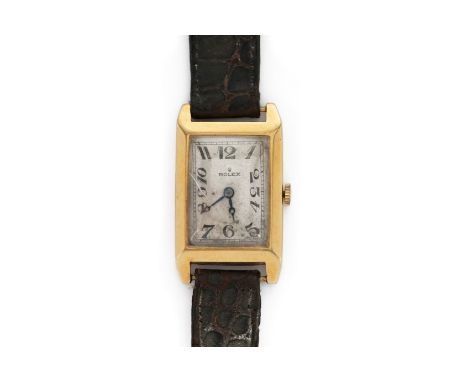A gentleman's vintage 18ct yellow gold Rolex wrist watch. The watch having a tank-style case, nr 32 6475, stamped R.W.C Ltd d