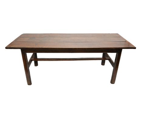 Early 18th century rustic oak refectory table, circa 1700, three plank top, on four chamfered legs, of good colour and patina