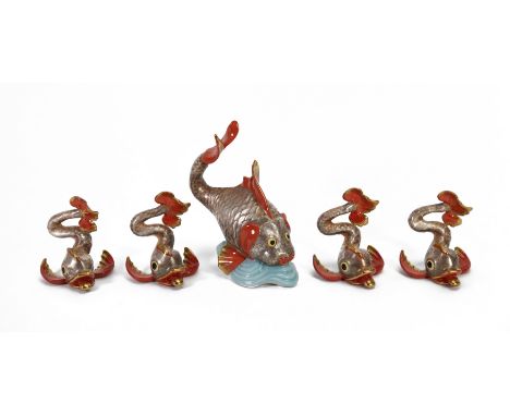 A 20th century porcelain Herend carp, approx 14 cms, together with four miniature Herend carp approx 8 cms, each with blue fa