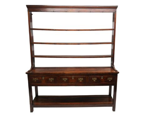18th Century oak open rack dresser, with three shelves and three drawers, with brass swan neck handles with openwork escutche