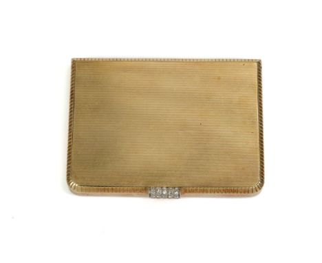 An Art Deco 14/15ct yellow gold and diamond compact, (1922-1925) mm J.R, having an engine turned finish with a decorated edge