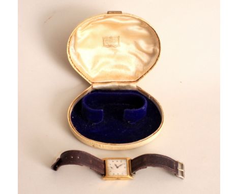 An 18ct gold Longines gentleman's wristwatch with eighteen jewel movement, with London import marks 1929, white enamel dial w
