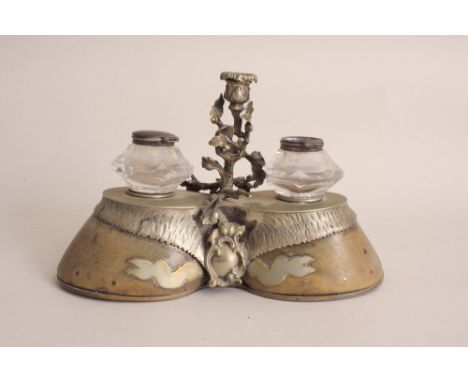 A 19th century silver plated twin horse hoof and cut glass inkwell, by Elkington, Mason & Co., circa 1850, centred with a scr