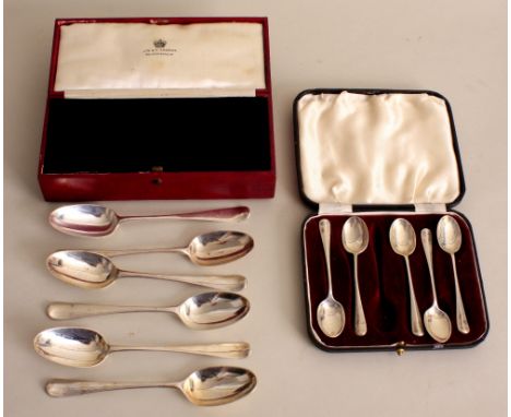 A cased set of six George III silver dog nose pattern spoons, by John William Thomas, London 1771, in their rectangular leath