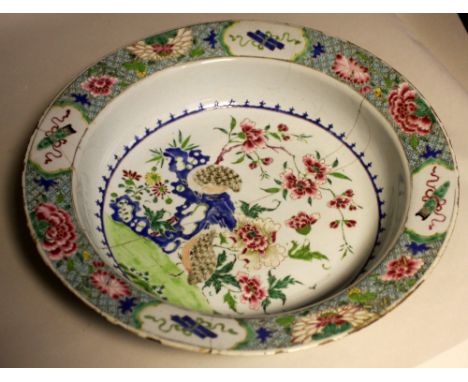 An 18th century Chinese famille verte basin, decorated with quail and foliage (cracked and repaired), 39.5cmDiam