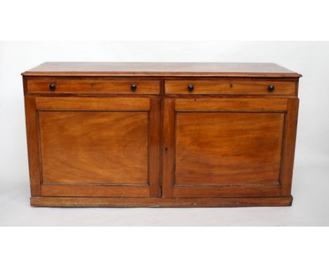 A Victorian mahogany sideboard, rectangular top over two frieze drawers over two cupboards, raised on plinth, 162cmW x 56cmD 