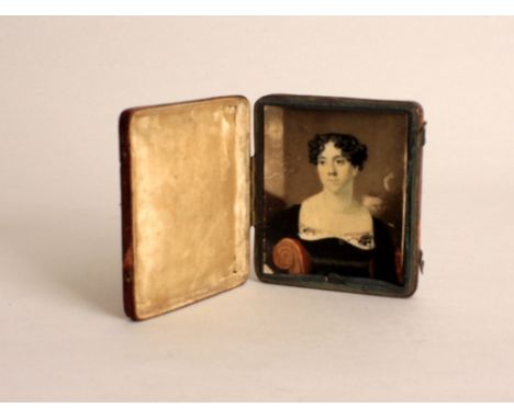 A 19th century oil miniature, ivory on board, portrait of a woman seated, 6.5cm x 8cm
