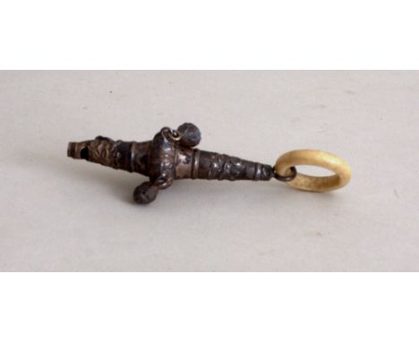 A Victorian silver babies rattle, whistle and teether, Chester circa 1850, chased foliate decoration, four bell with ring att