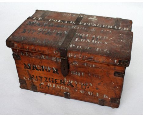 An Edwardian hide and iron bound trunk with cotton lined interior and extensive stenciled lettering, Lt. Col. A.P. Fitzgerald