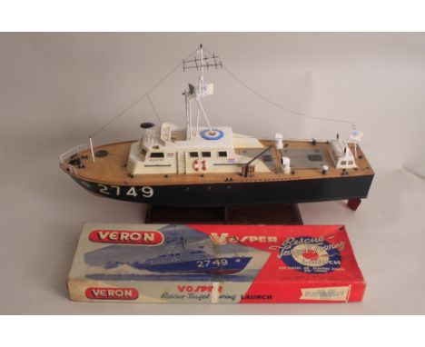 A scale model of an R.A.F. high-speed rescue launch, carved wooden hull with internal motor, drive shaft and propeller, mount