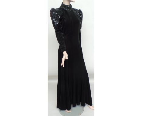 Three 80's dresses. A 'Frank Usher' full length black velvet fitted and flared evening dress. The dress has a high sequinned 