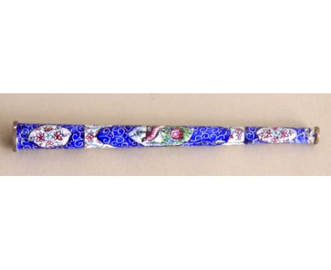 A 19th century enamel cigarette holder, possibly Russian, decorated with blue field, two birds and foliate-scroll throughout,