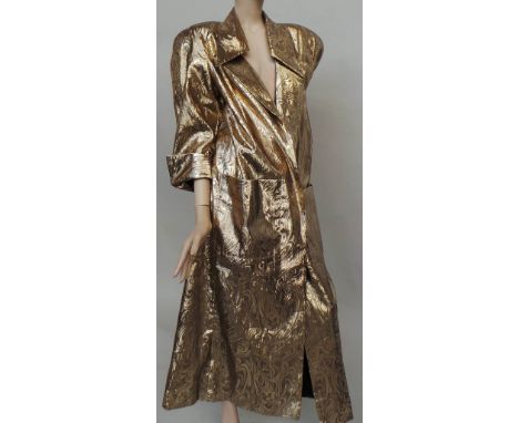 A stunning 1980's 'Frank Usher' metallic gold coat with padded shoulders and unusual deep collar feature. The coat is lined a