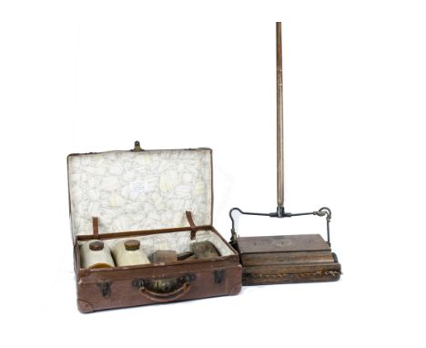 A Ewbank 'Success' carpet cleaner, together with two wooden plane tools, two stoneware vessels and a brass shovel in a vintag