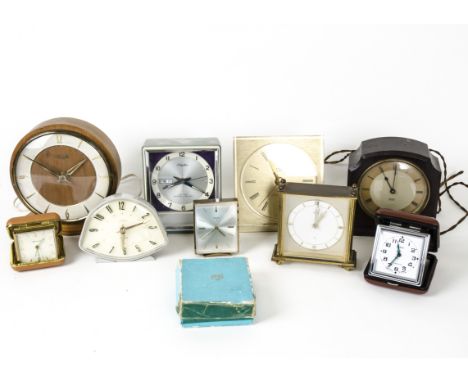 Art Deco and Later Desk and Travel Clocks, a group of nine including a Bakelite cased electric Smiths example, walnut cased b