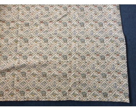A large roll of Late 19th/Early 20th Century fabric, with chain stitched flowers and leaves upon a cream linen ground, width 