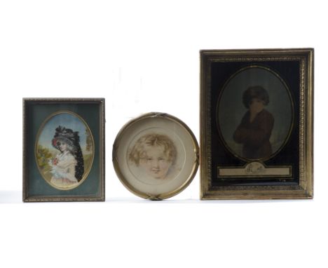 A miniature silk work portrait of a lady in the Georgian taste,  together with a circular framed miniature print of a child a