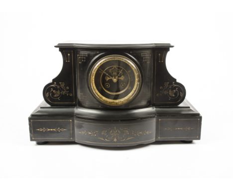 A Victorian slate mantle clock of architectural form, the gilt rimmed dial with Roman numerals, the structure decorated with 
