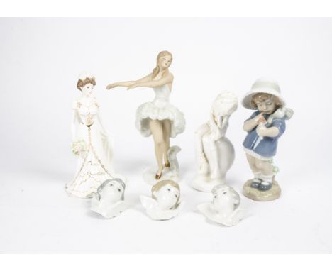 A small quantity of Lladro and Nao figures,  including three boxes of putti heads, a Wallendorf figure of a ballerina, and Sp