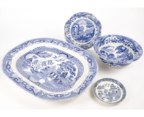 A blue and white antique meat plate of sizeable proportions, decorated in the willow pattern, together with a quantity of Cop
