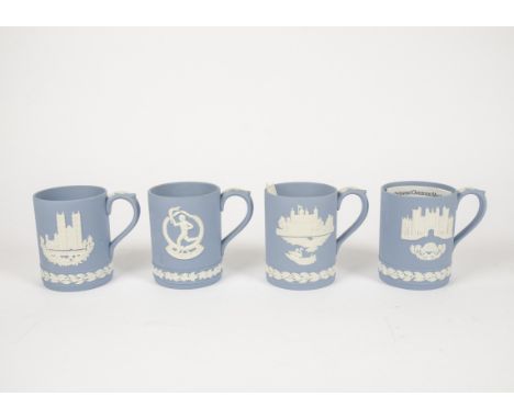 A selection of 20th Century Wedgewood Jasperware, in blue, white and black, consisting of a 1973 'Tower of London' mug, 1976 