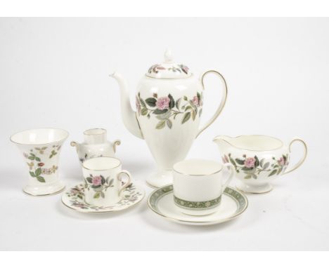 A Royal Worcester part coffee set in the Hathaway Rose pattern,  together with another part set of tea wares in the Rondeley 