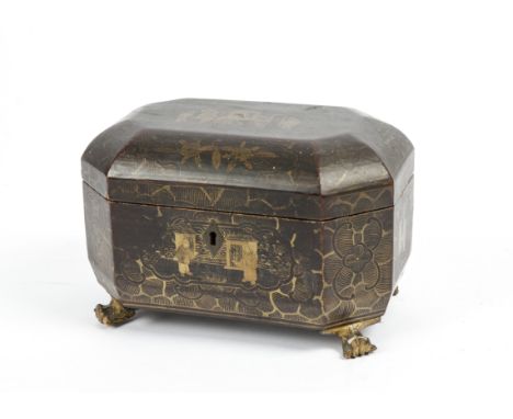 A Chinese lacquered caddy on four beasts' feet, of lozenge shaped form with multiple panels of figures and architecture in th