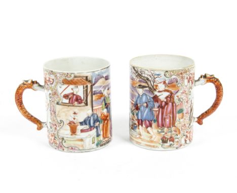 A pair of 19th Century Chinese Famille rose beakers, the ceramic bodies with overglaze decoration for the European export mar