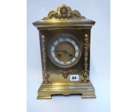 Edwardian Brass cased clock mantel clock with french 8 day movement, applied column foliate decoration and numeral face 