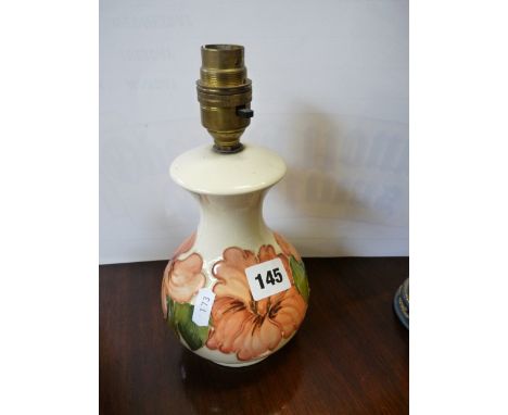 Cream ground Moorcroft lamp base with impressed marks to base 