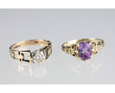 Two hallmarked 9ct gold rings to include one set with an oval cut amethyst on scrolled shoulders (London 1972, size n.5), tog