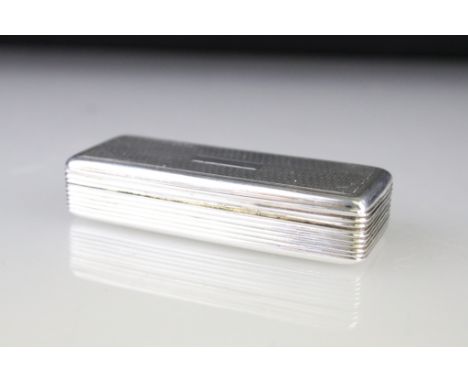 George IV silver snuff box, engraved repeating pattern to the hinged lid, vacant rectangular cartouche, ribbed body, gilt lin