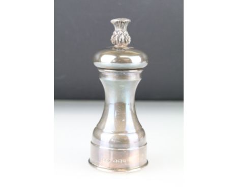 Silver pepper grinder, plain polished baluster form with cast pineapple finial, makers BD, Sheffield 1969, height approx 11cm