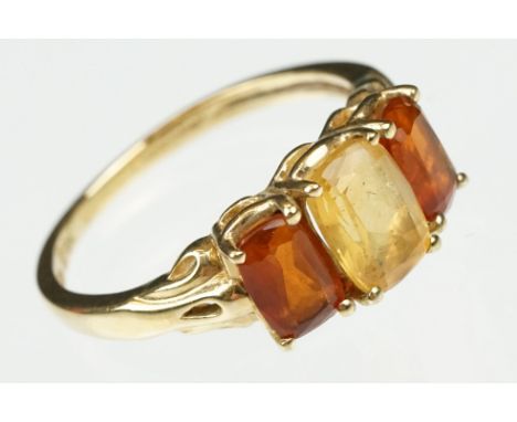 Citrine and orange gemstone 9ct yellow gold three stone ring, claw settings, tapered shoulders, ring size L½ 