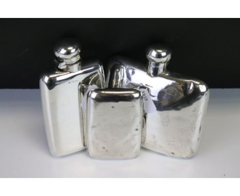 Two silver hallmarked hip flasks both with hinged lids (one hallmarked Chester 1906, the other with rubbed hallmarks) togethe