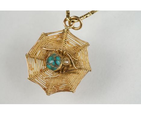 Turquoise and seed pearl 9ct yellow gold pendant necklace, modelled as a spider and spider web, the turquoise and seed pearl 