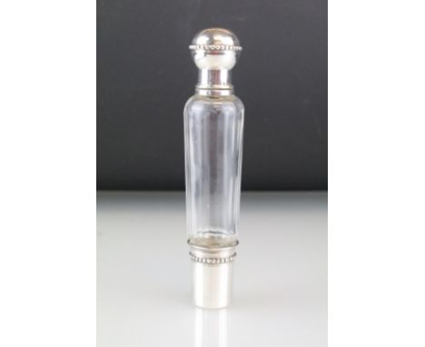 Antique French silver spirit flask bottle having a tapering glass bottle with tapering sides, silver orb lid and detachable s