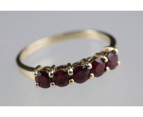 Ruby 14ct yellow gold ring, five round mixed cut rubies, diameter approx 3.5mm, shared claw settings, ring size O½ 