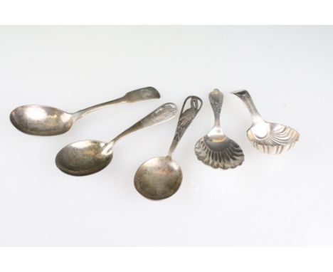 Five silver spoons to include two caddy spoons, both shell formed and bright cut (one hallmarked Sheffield 1895 for Atkin Bro