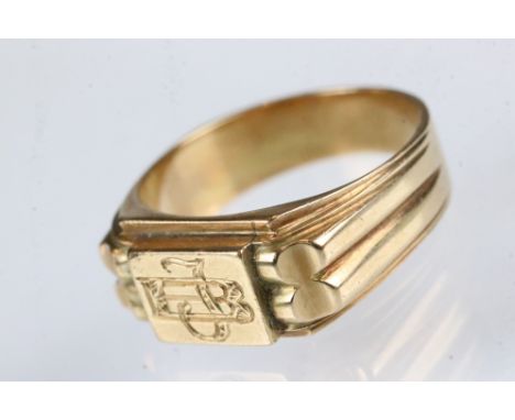 Yellow metal signet ring, engraved initials to the rectangular head, ring size N½ 