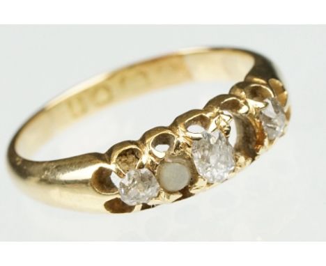 Victorian diamond and pearl yellow gold ring. three old cut diamonds, single seed pearl, one missing, coronet claw set, taper