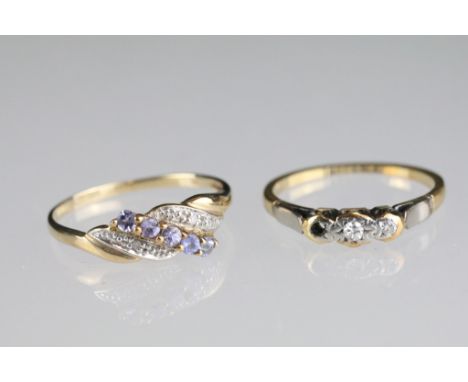 9ct crossover ring set with five round cut blue stones (hallmarked 9ct, size P), together with an 18ctr gold and platinum thr