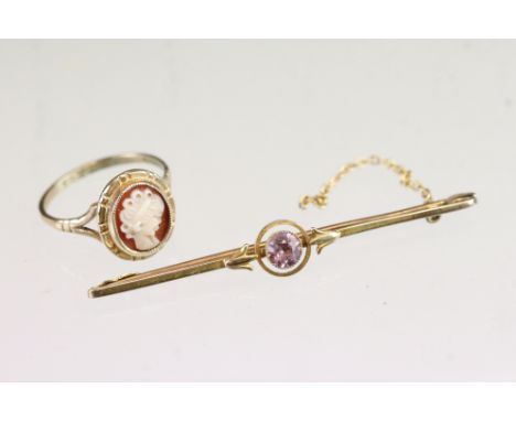 9ct gold bar brooch set with a central round cut pink stone to the centre (marked 9ct) together with a 9ct gold cameo ring (9