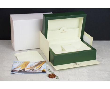 Rolex - empty green leather watch box having wave design panel to top with gold tone crown logo. The box having a suede lined